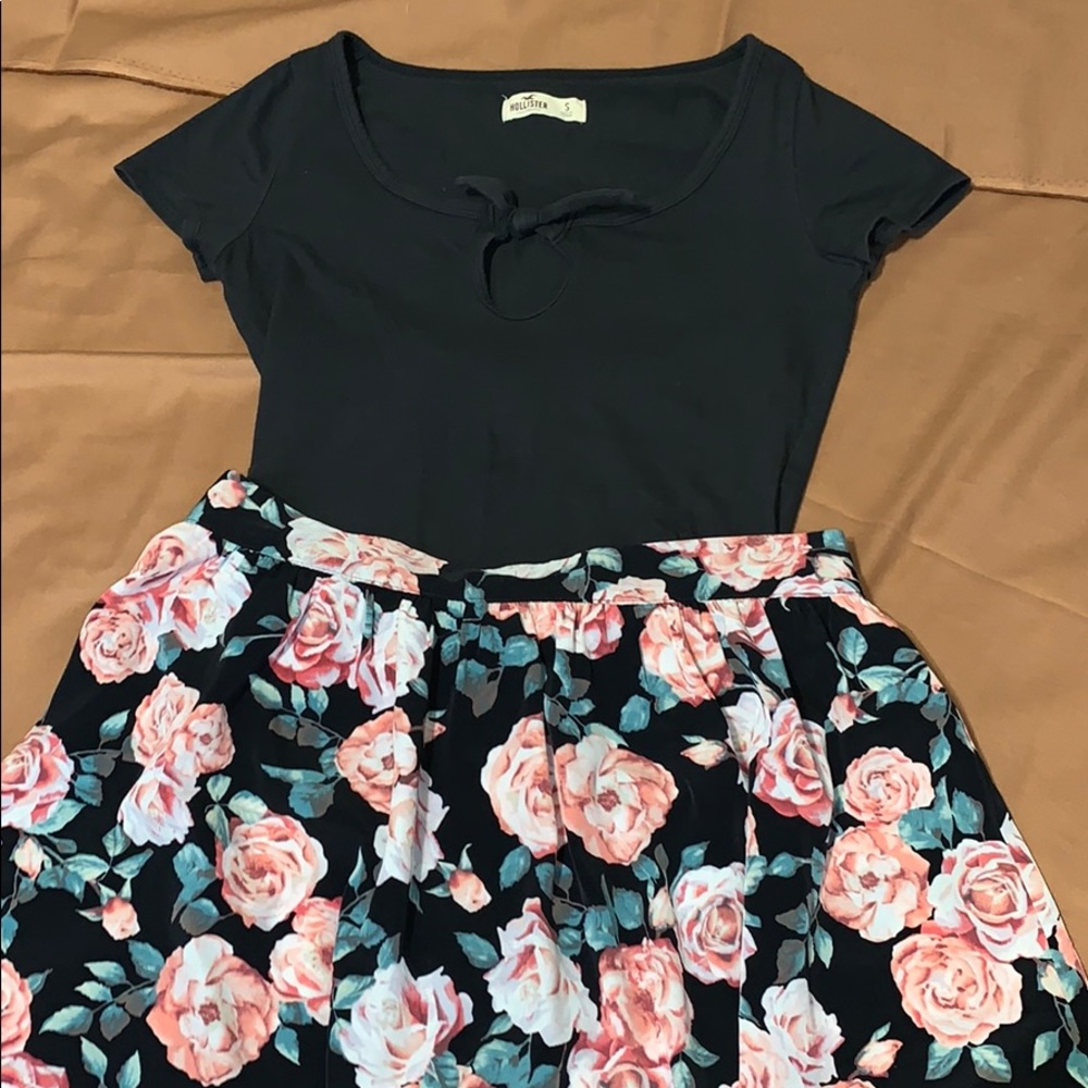 A bodysuit and skirt complex